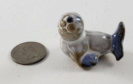 Vintage Seal Figurine Red Clay Blue Milky White - £13.58 GBP