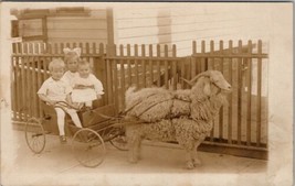 RPPC Children in Small Cart Pulled by Beautiful Sheep on Sidewalk Postcard V20 - £23.73 GBP