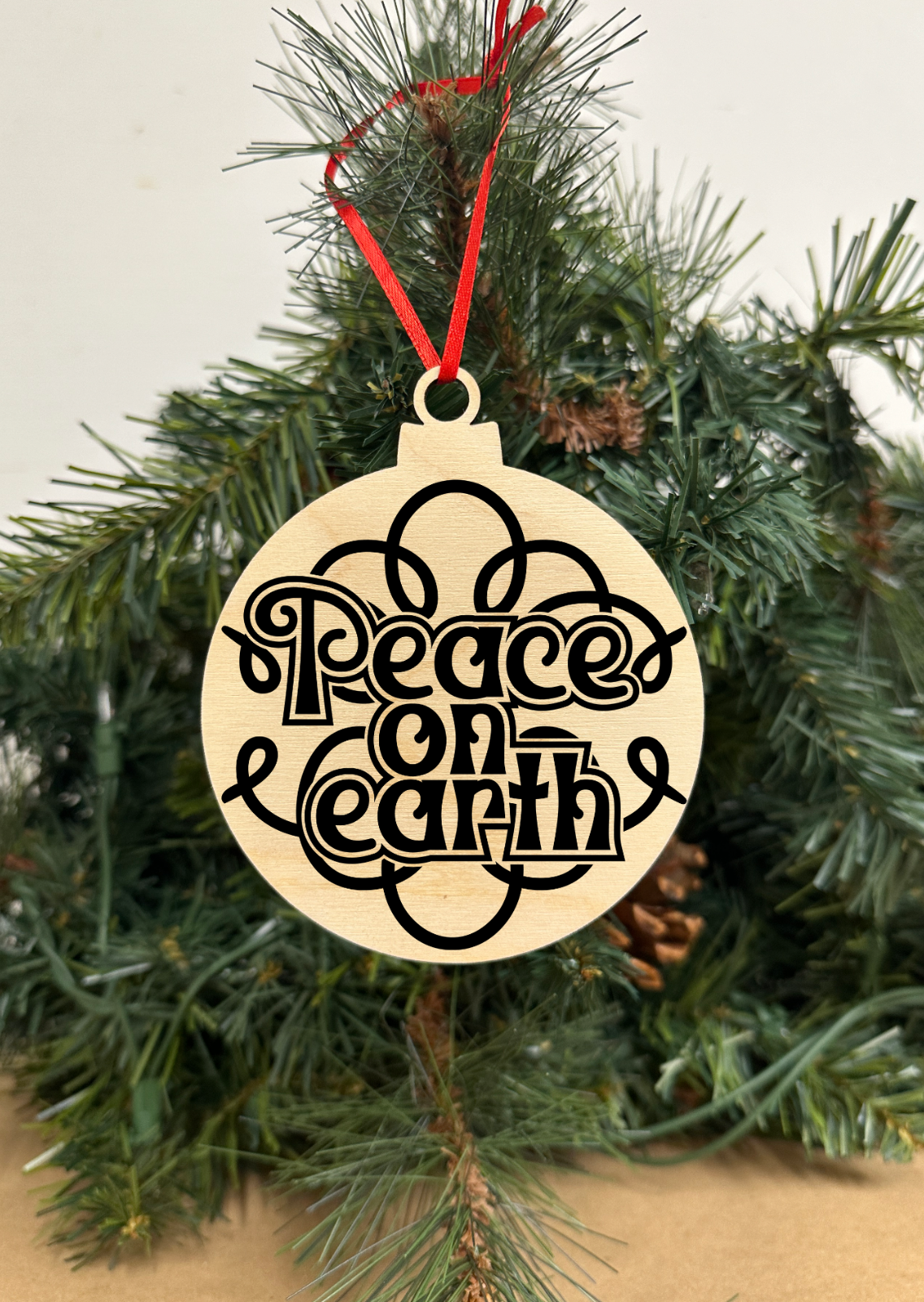 Piece on Earth Engraved Wooden Christmas ornament Snowball shape, Holida... - $9.49