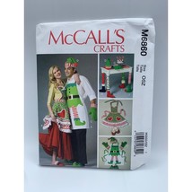 McCall&#39;s Christmas Apron Hat Slippers Table Leg Sewing Pattern M6860 - uncut - £10.11 GBP