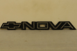 1985-1988 Chevrolet Nova Rear Fender Logo Bowtie Script Emblem OEM - £3.40 GBP