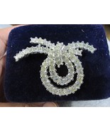 ""SILVER TONE WITH CLEAR RHINESTONES - BOW SHAPE"" - VINTAGE BROOCH - NAPIER - $8.89