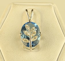 Vintage Sterling 925 NV Avon Blue Topaz Oval Stone with Floral Leaves Pendant - £23.81 GBP