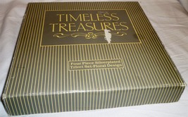 BRAND NEW TIMELESS TREASURES SET OF 4 SILVERPLATED EMBOSSED TRIVETS - $38.00