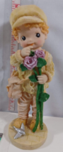 8 inch boy with purple flowers and air plane fiquirine #de2102672b - £4.69 GBP