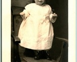 RPPC Adorable Smiling Baby Standing On Chair Wearing White AZO Postcard H5 - $3.91