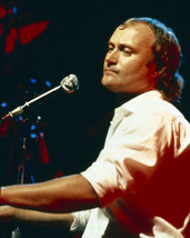 Phil Collins in concert seated at piano in shirtsleeves playing 16x20 Poster - £16.08 GBP