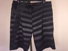 OAKLEY MOTION 4-WAY STRETCH BOARDSHORTS SZ 34 &quot;Jet Black&quot; - £27.25 GBP