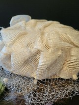 1950'S CLIP ON HAT IVORY WITH BLACK BOWS ON SIDE image 2