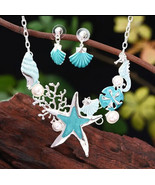 Teal starfish sealife necklace earring set - $17.82