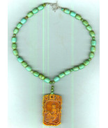 Carved &quot;Cinnabar&quot; Pendant and Turquoise round and barrel Turquoise beads - €69,00 EUR