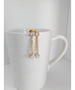 Clear white cubic zirconia round and pear drop post gold plated earrings... - $50.00