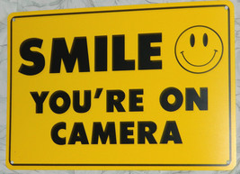 New &quot; SMILE YOU&#39;RE ON CAMERA&quot; 9.5&quot; x 14&quot; Weatherproof  Bright Yellow Vid... - $12.16