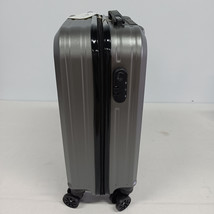 traveling luggage 20 inches with four swivel wheels silver  - $158.00
