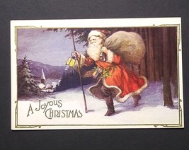 A Joyous Christmas Santa in the Snow w/ Lantern Gold Embossed Postcard c1920s (a - £8.01 GBP