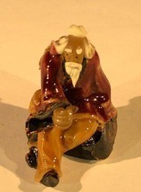 Miniature Ceramic Figurine   Man Sitting on Bench 2&quot; - £6.34 GBP