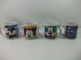 Lot of 4 Walt Disney Mickey Mouse Donald Duck Goofy Mugs - $30.10