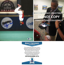 Ozzie Smith signed St Louis Cardinals baseball 8x10 photo proof Beckett COA auto - £94.95 GBP