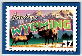 Greetings From Wyoming Large Letter Chrome Postcard USPS 2001 Deer Mountains - £6.79 GBP