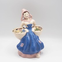 Porcelain Figurine Dutch Girl Wears Flowers-
show original title

Origin... - $54.05