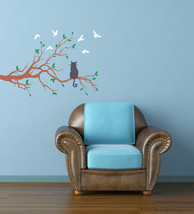 Cat patiently waits on tree branch for birds. - £21.53 GBP
