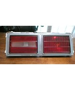 1975-1979 CHEVY NOVA TAILLIGHT HOUSING WITH LENS &amp; CHROME BEZEL OEM RH - $3,469.28 MXN