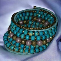9 strand turquoise color wire wrap bracelet - $368.75 MXN