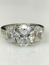 Precioso anillo de compromiso con tres diamantes de talla ovalada de 3,50... - £204.67 GBP