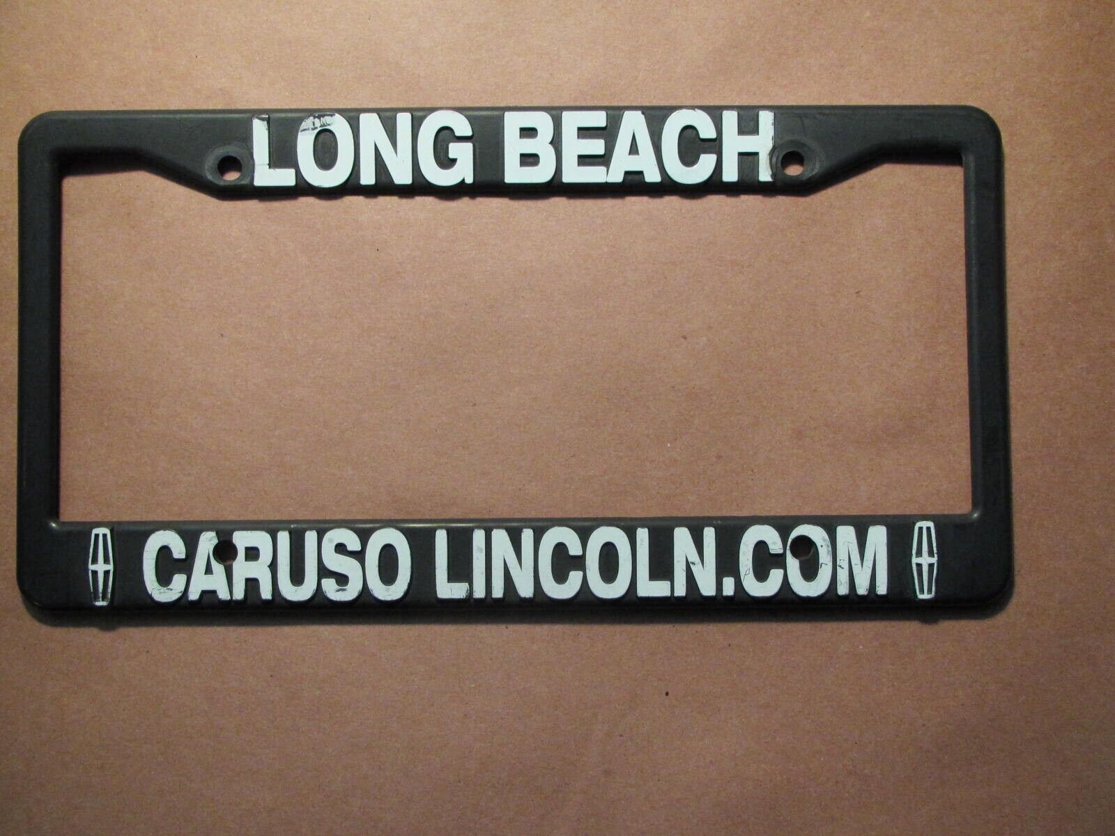 Long beach Caruso Lincoln Dealer License Plate Frame Plastic - $17.60