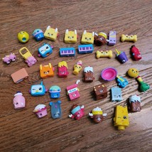 Shopkins Lot of 38 Figures Colorful Food Music Lawnmower Bone Toys - £15.77 GBP