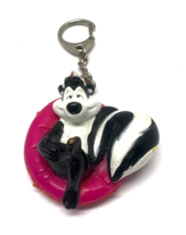 Pepe Le Pew Skunk On Couture Pillow Vintage PVC Keychain - $146.42 MXN