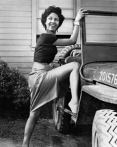 Dorothy Dandridge shows some leg as she gets in Jeep 8x10 real photo - $10.99