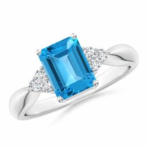 ANGARA Emerald-Cut Swiss Blue Topaz Ring with Trio Diamonds in 14K Gold - £1,112.81 GBP