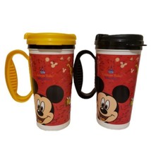 2 Walt Disney Plastic Travel Cups 2009 Many Disney Characters Great For Kids - $9.89