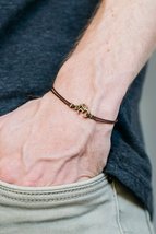 OM bracelet for men bronze Om charm, brown string, handmade yoga gift for him - £7.90 GBP+