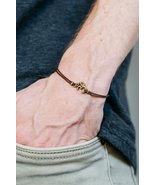 OM bracelet for men bronze Om charm, brown string, handmade yoga gift fo... - £8.01 GBP+