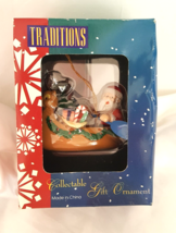 NEW Ornament Traditions Santa Paddling Reindeer Canoe with gifts Collectable  - £11.99 GBP