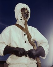 US Navy Sailor tests protective mask World War II New 8x10 Photo - $8.81
