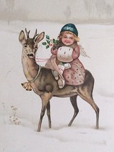 A Happy Christmas Girl with Muff Riding a Deer Angel Bells Holly Postcard c1910s - £23.44 GBP