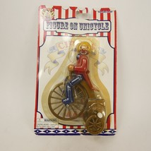 Vintage Wind Up Circus Figure On Unicycles New in Package ADK15 - £9.43 GBP