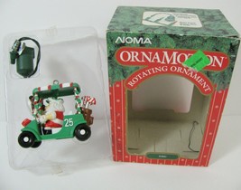 VTG  Noma Ornamotion Rotating xmas Ornament Fore Golf Cart Santa Reindeer 1989 - £13.97 GBP
