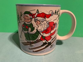Potpourri Press Santa &amp; Mrs. Claus Skiing in Summer/Winter Ceramic Coffee Mug - £8.83 GBP