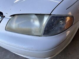 Driver Left Headlight Fits 00-02 MAZDA 626 104705744 - $76.31