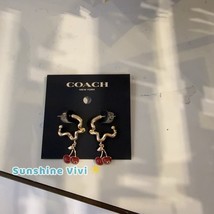 NEW Coach Cherry Wavy Huggie Earrings Gold/Red CAA16 - £74.17 GBP