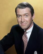 James Stewart dark suit pattern tie against gold wall smiling 16x20 Canvas - $69.99