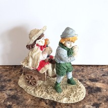 Christmas Village Figurine Boy Hauling Girl on a Cart 3&quot;Tall Resin Victo... - $6.92
