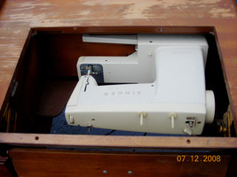 Singer Sewing Machine with Desk and Foot Pedal - $100.00