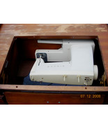 Singer Sewing Machine with Desk and Foot Pedal - $100.00