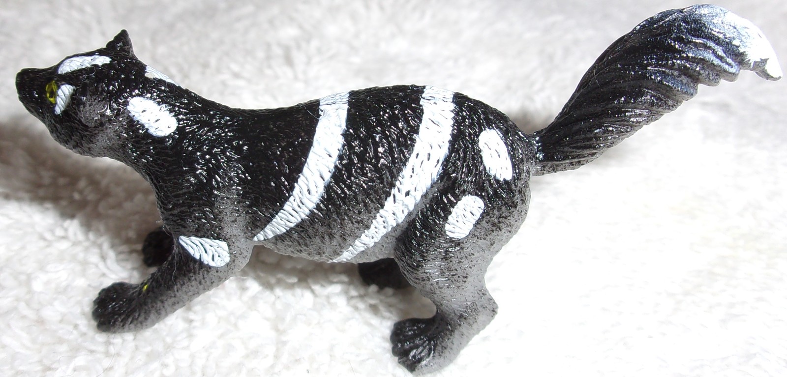 Mini Plastic Spotted Skunk Zoo Animal Figure - $1.99