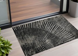 2&#39; X 3&#39; Black and Ivory Abstract Washable Non Skid Indoor Outdoor Area Rug - $60.99